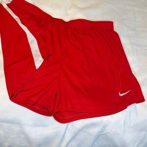 Nike Red Women's Athletic Shorts with White Stripe